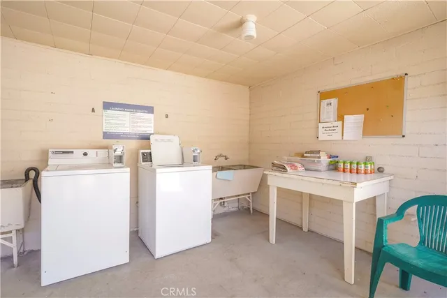 an aerial view of residential house with outdoor space and swimming pool