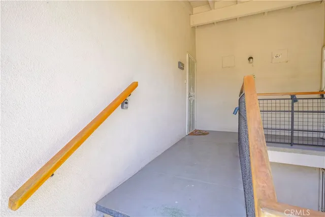 a view of a staircase and storage