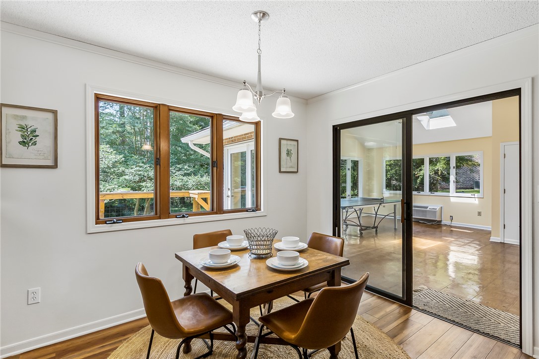 207 Laurel Ridge Road Anderson, SC 29621 - Photo 18 of 50 A quaint dining area with warm hardwood flooring and an abundance of natural light.