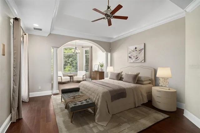 a bathroom with a sink vanity mirror and toilet