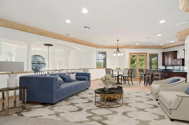 a view of a swimming pool with a sitting space