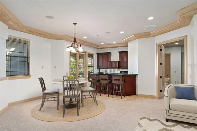 a view of a garden with an outdoor seating