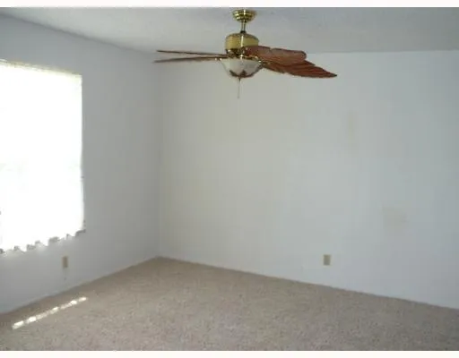 a view of a window in an empty room