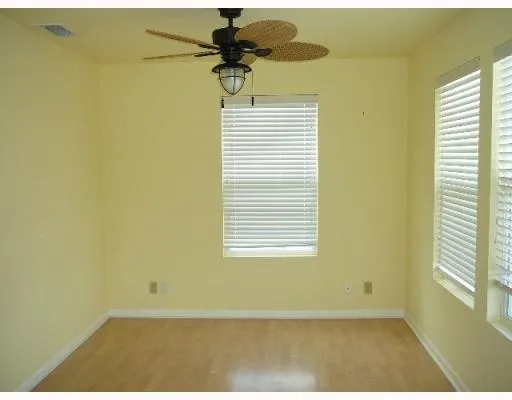a bathroom with a granite countertop toilet a sink and bathtub