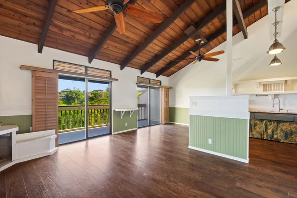 a view of livingroom with furniture and floor to ceiling window