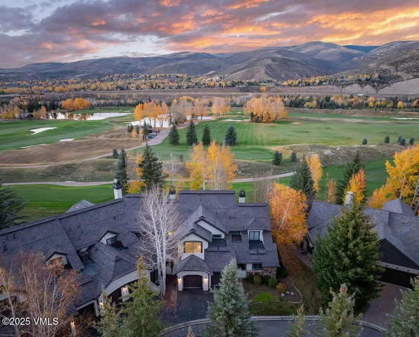 an aerial view of a house with outdoor space