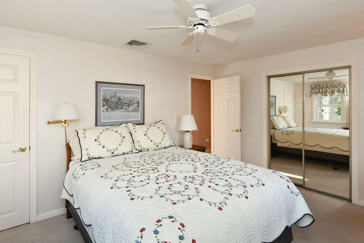 254 Cedric Road Centerville, MA 02632 - Photo 13 of 24 a bedroom with a large bed and a window