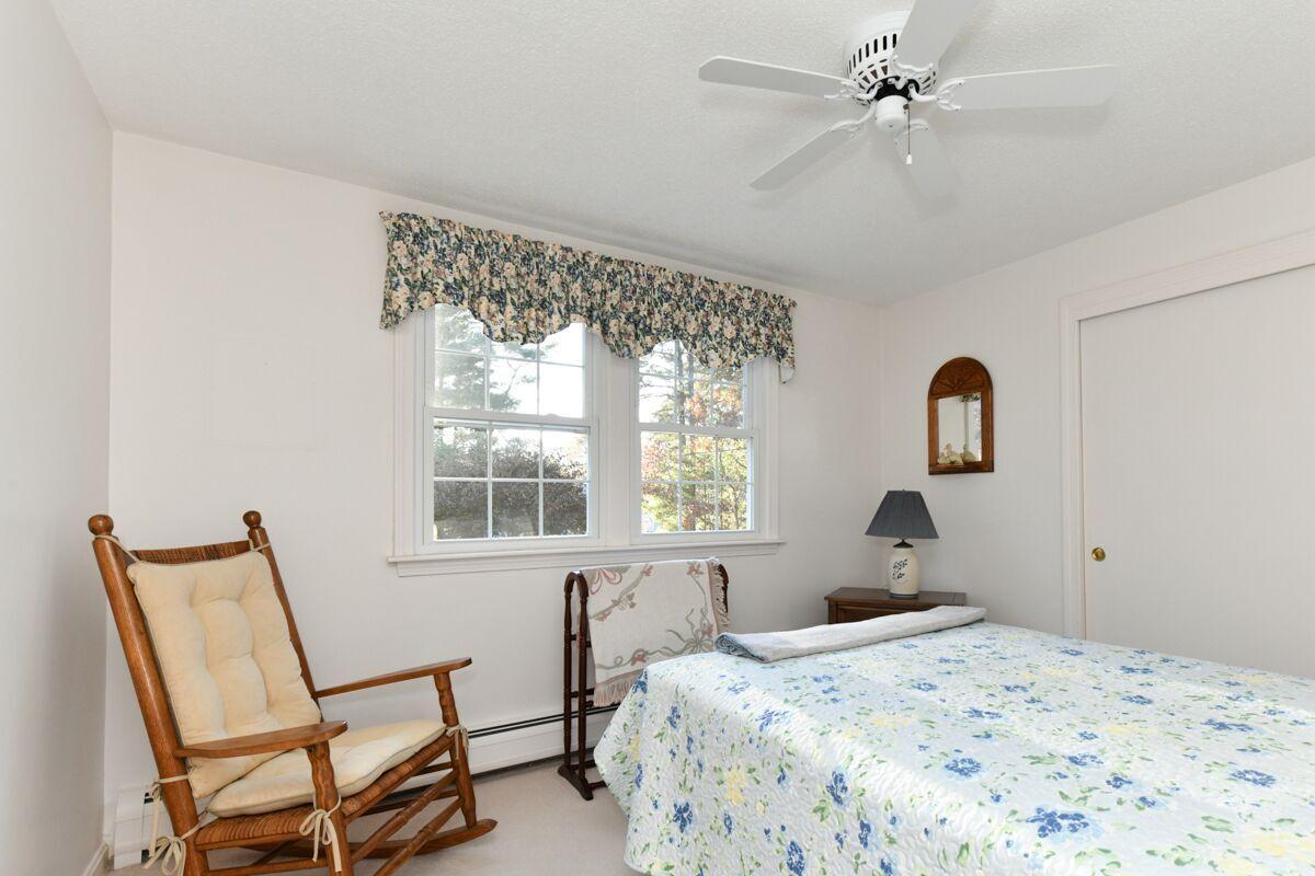 254 Cedric Road Centerville, MA 02632 - Photo 16 of 24 a bedroom with a bed and a window