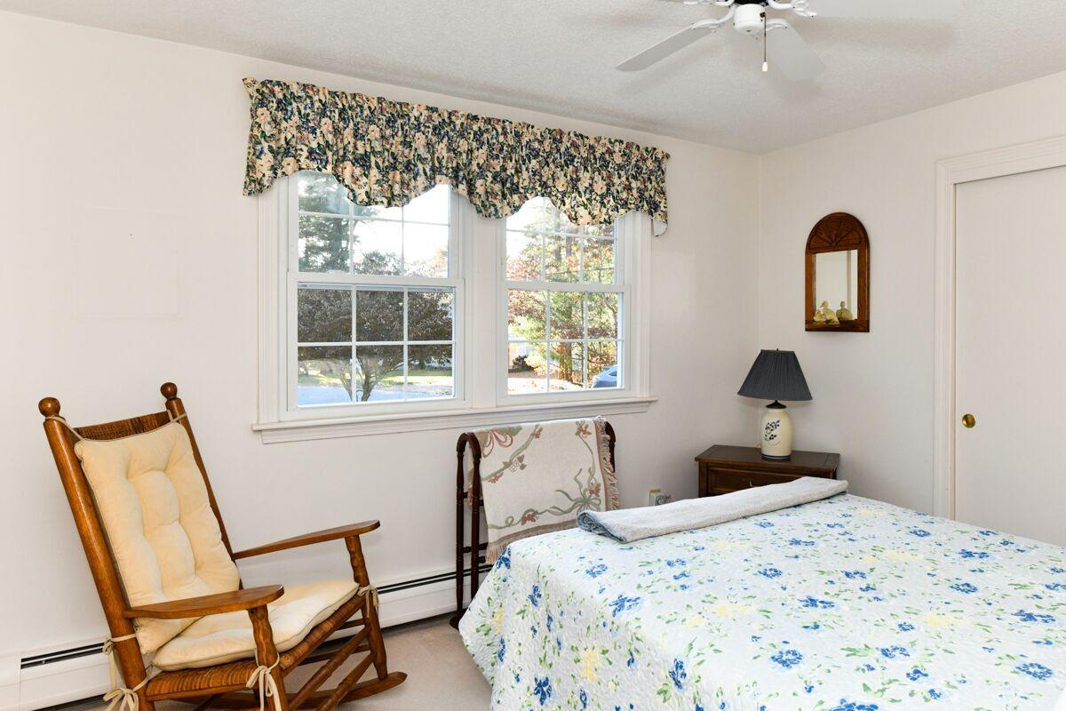 254 Cedric Road Centerville, MA 02632 - Photo 18 of 24 a bedroom with a bed and a window