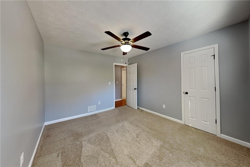 4304 Falcon Crest Drive Flowery Branch, GA 30542 - Photo 11 of 21 a view of an empty room