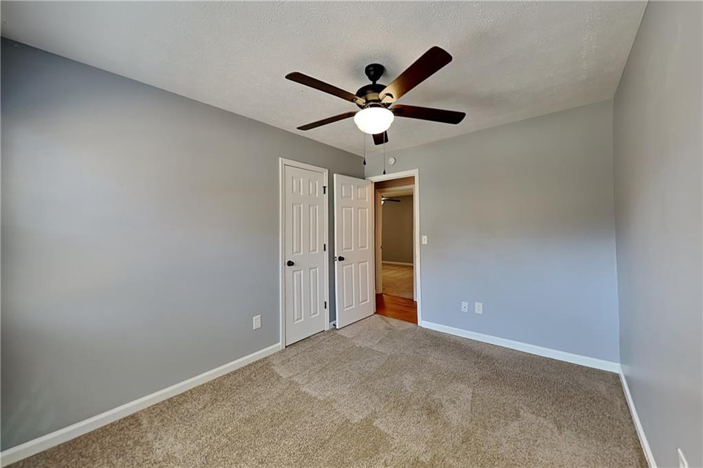 4304 Falcon Crest Drive Flowery Branch, GA 30542 - Photo 13 of 21 a view of an empty room