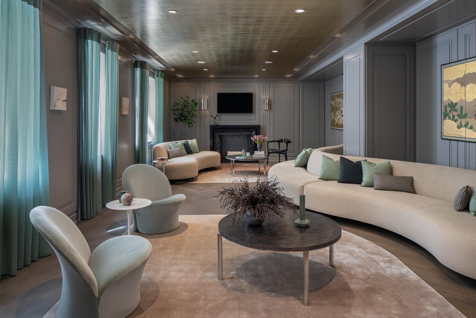 225 West 86th Street, Unit 407 Manhattan, NY 10024 - Photo 11 of 20 a living room with furniture and a flat screen tv