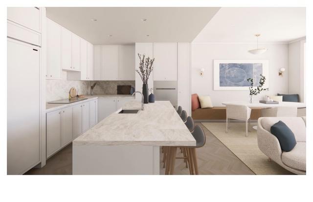 225 West 86th Street, Unit 407 Manhattan, NY 10024 - Photo 3 of 20 a kitchen with stainless steel appliances kitchen island granite countertop a table chairs sink and cabinets