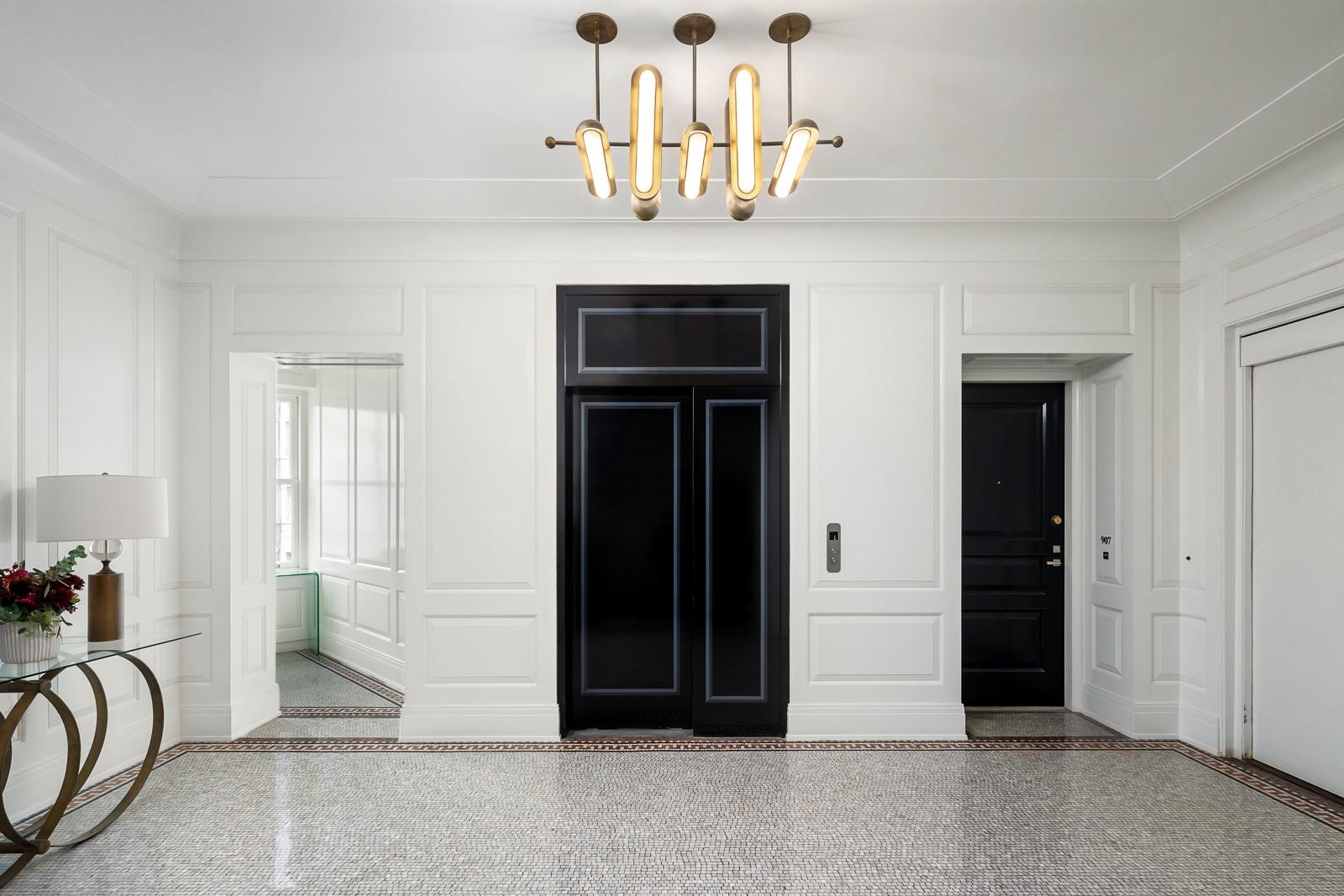 225 West 86th Street, Unit 407 Manhattan, NY 10024 - Photo 5 of 20 a view of a livingroom with a chandelier