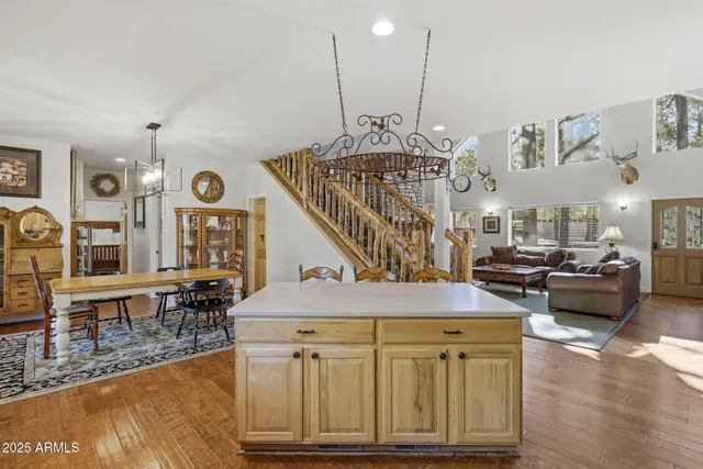 a view of a livingroom with furniture and wooden floor