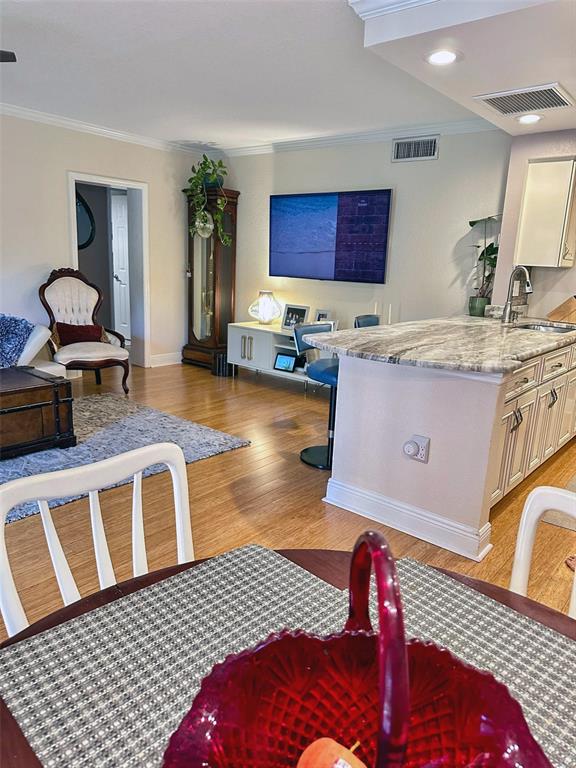 8911 Blind Pass Road, Unit 220 St. Pete Beach, FL 33706 - Photo 30 of 67 a living room with furniture