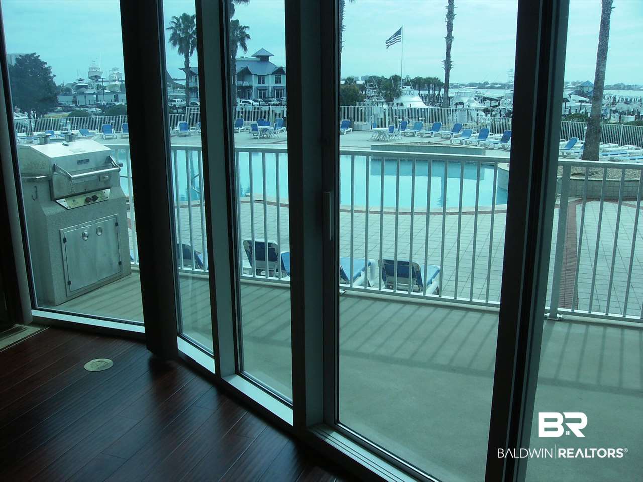 27800 Canal Road, Unit 110 Orange Beach, AL 36561 - Photo 23 of 27 view of pool from inside