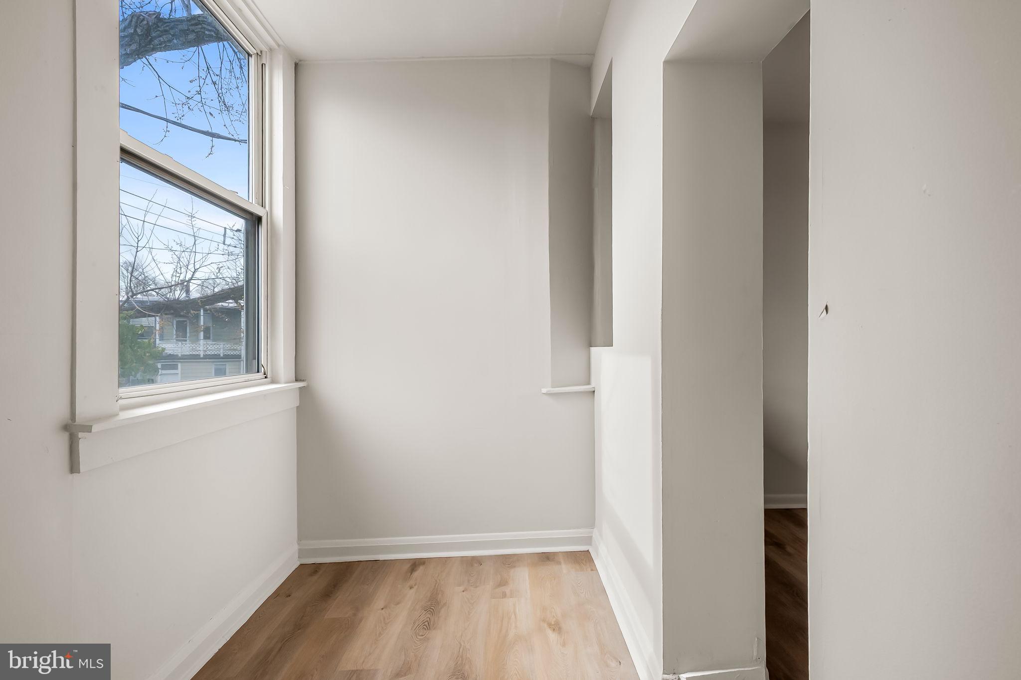 3021 Belair Road Baltimore, MD 21213 - Photo 18 of 27 a view of a room that has a window in it