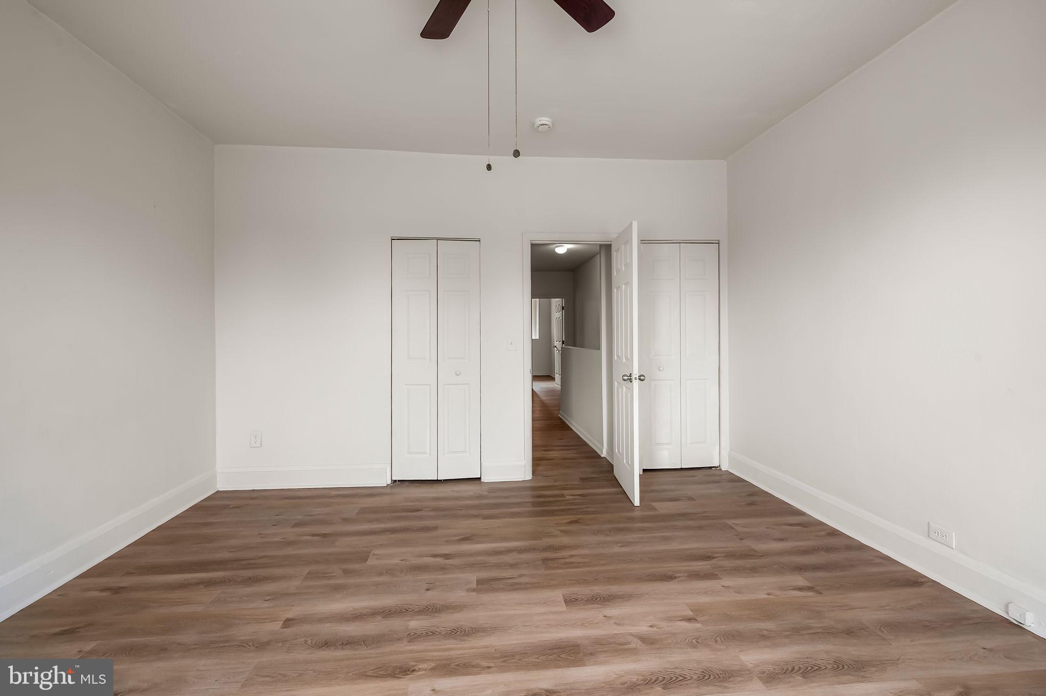 3021 Belair Road Baltimore, MD 21213 - Photo 23 of 27 a view of an empty room and wooden floor