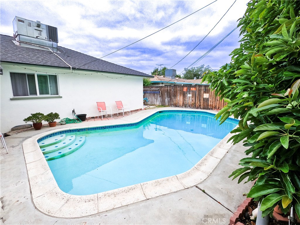 4757 Dundee Road Riverside, CA 92503 - Photo 3 of 26 a view of a swimming pool with an outdoor seating