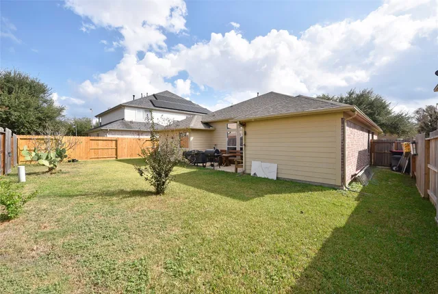 a house view with a garden space