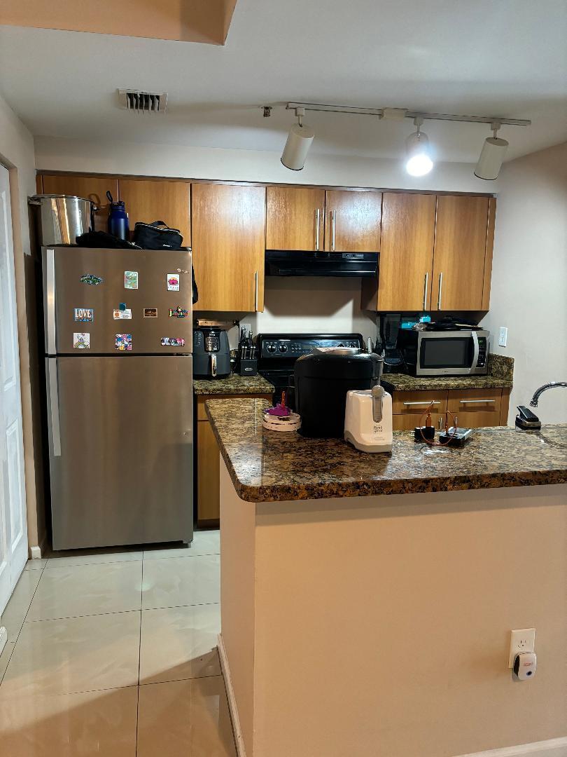 5940 West Sample Road, Unit 307 Coral Springs, FL 33067 - Photo 4 of 9 307 kit