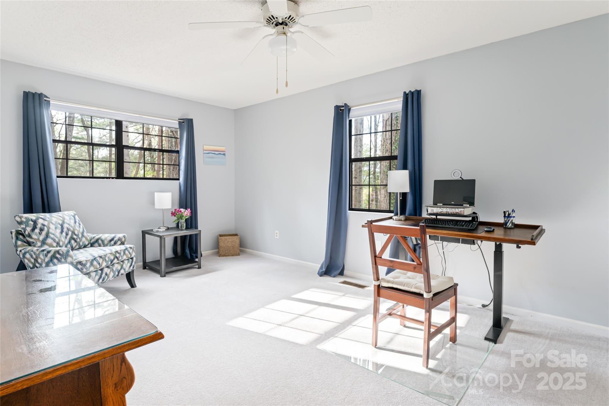 21 Mann Road Asheville, NC 28805 - Photo 25 of 36 a living room with furniture and a window