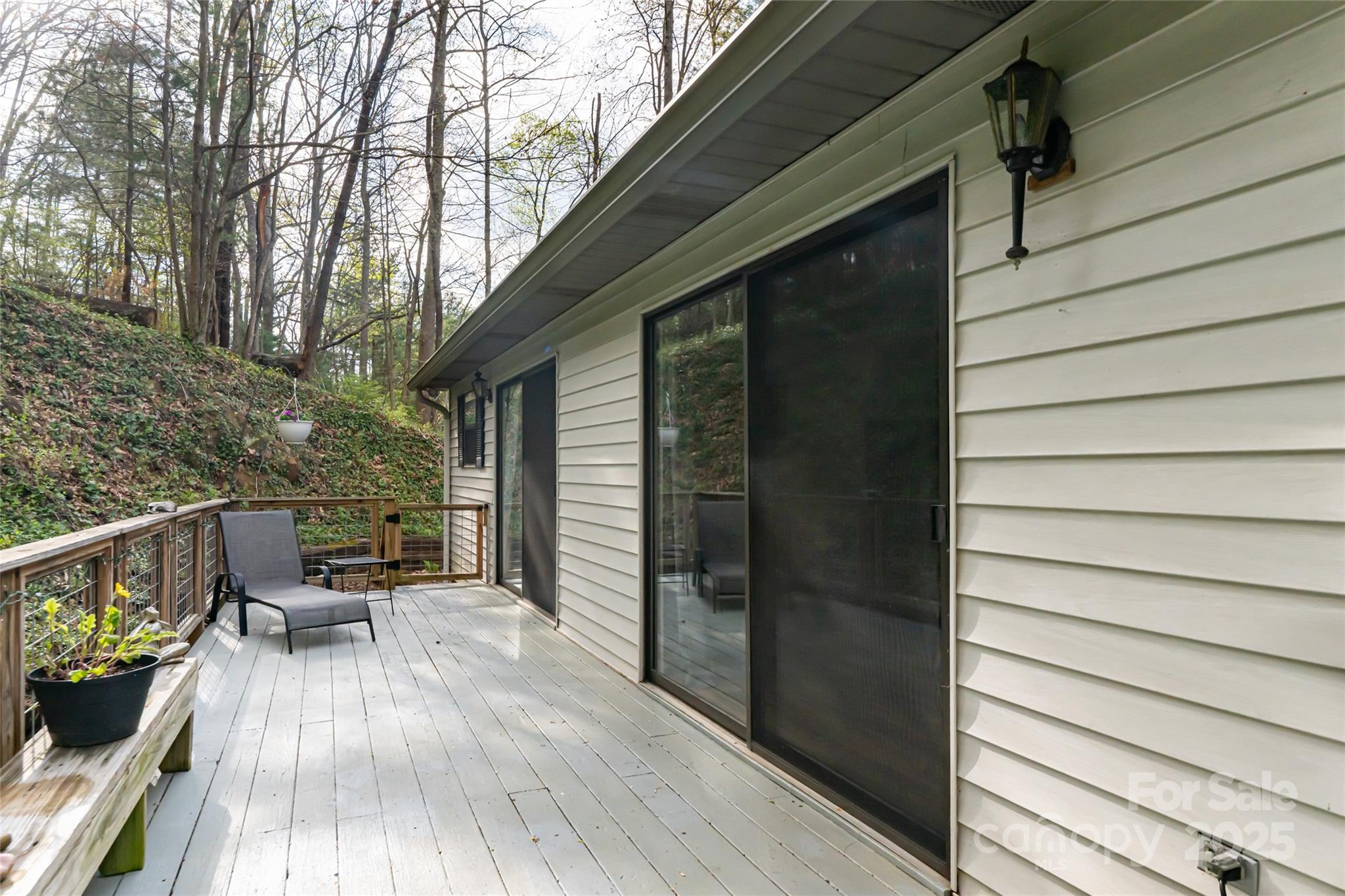 21 Mann Road Asheville, NC 28805 - Photo 30 of 36 a view of deck with furniture