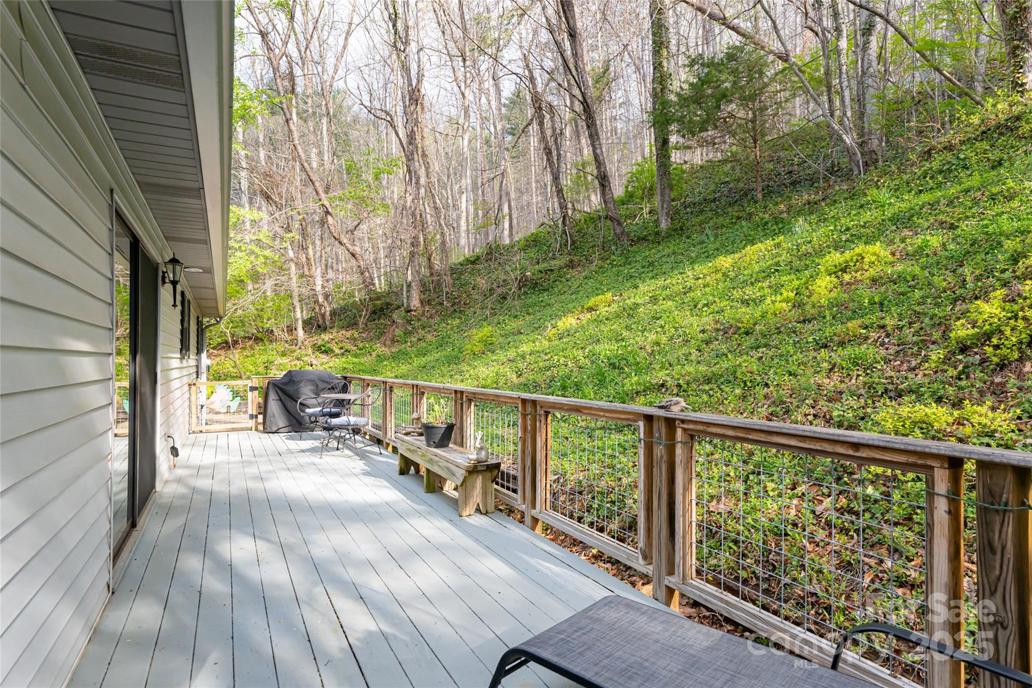 21 Mann Road Asheville, NC 28805 - Photo 31 of 36 a view of a balcony with chairs