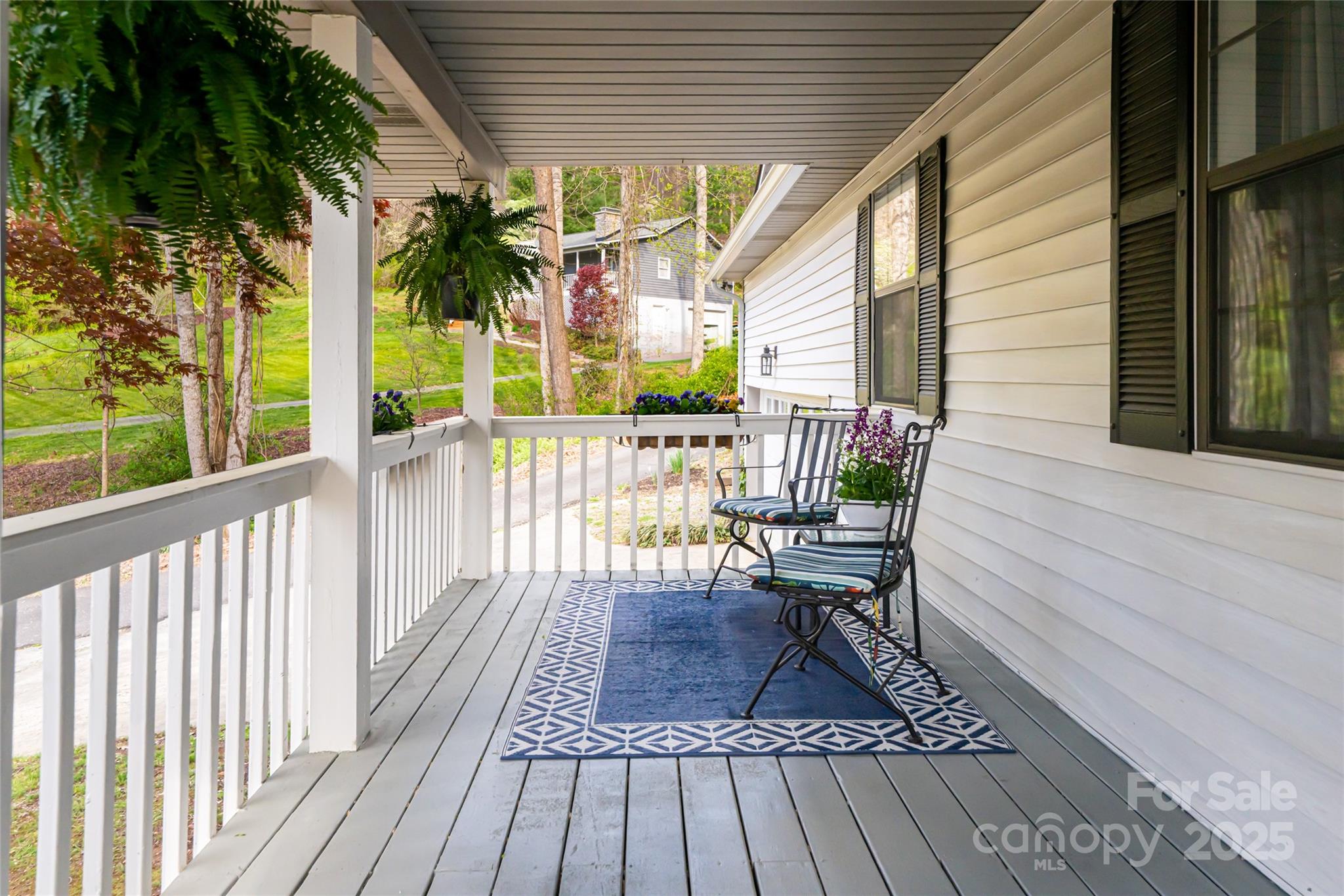 21 Mann Road Asheville, NC 28805 - Photo 6 of 36 a view of a two chairs in the balcony