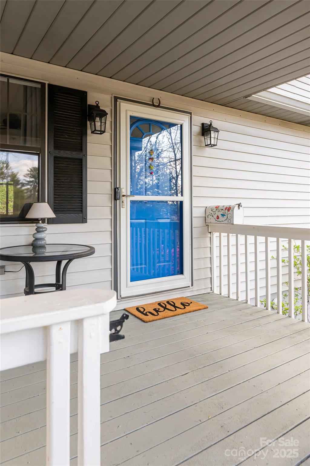 21 Mann Road Asheville, NC 28805 - Photo 7 of 36 a view of a house with wooden floor and a large window