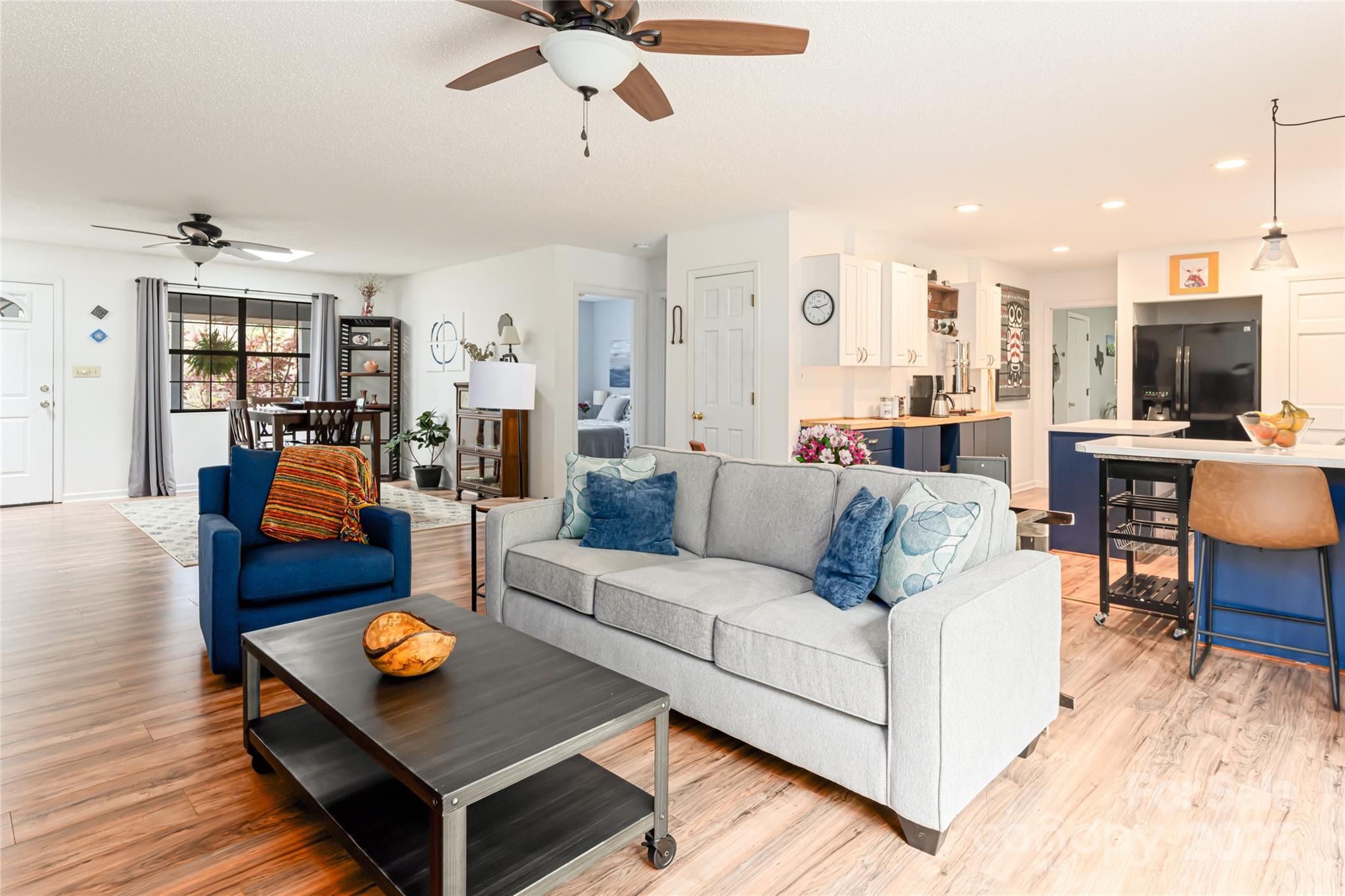 21 Mann Road Asheville, NC 28805 - Photo 9 of 36 a living room with furniture and wooden floor