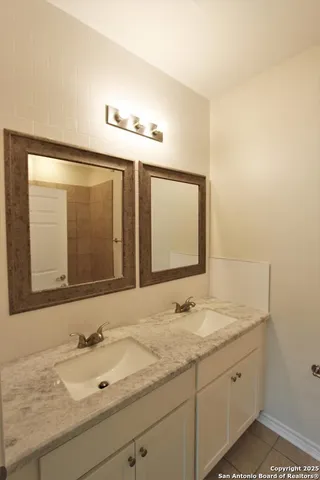 a bathroom with a shower and a bathtub