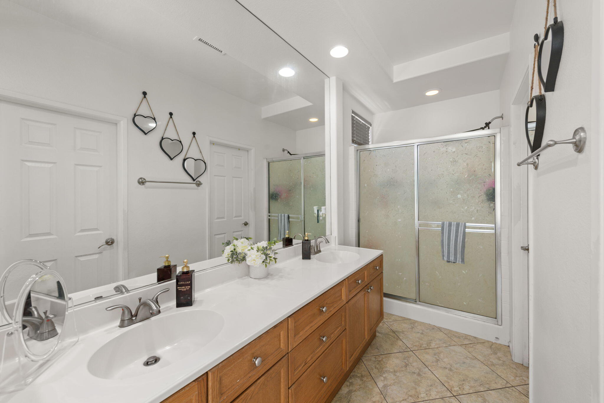 46450 Calle Raphael Indio, CA 92201 - Photo 20 of 29 a bathroom with a double vanity sink mirror and double