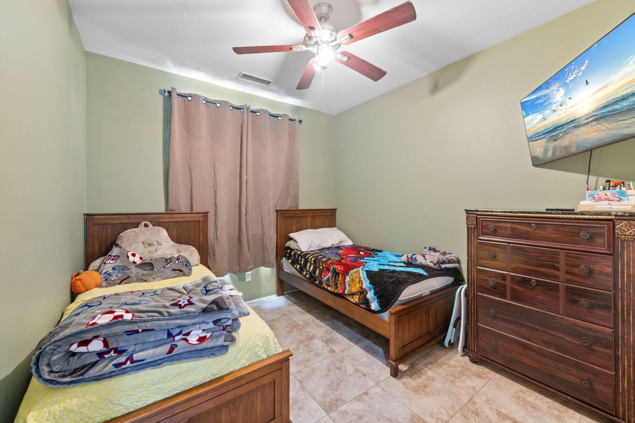 46450 Calle Raphael Indio, CA 92201 - Photo 22 of 29 a bedroom with a bed and dresser