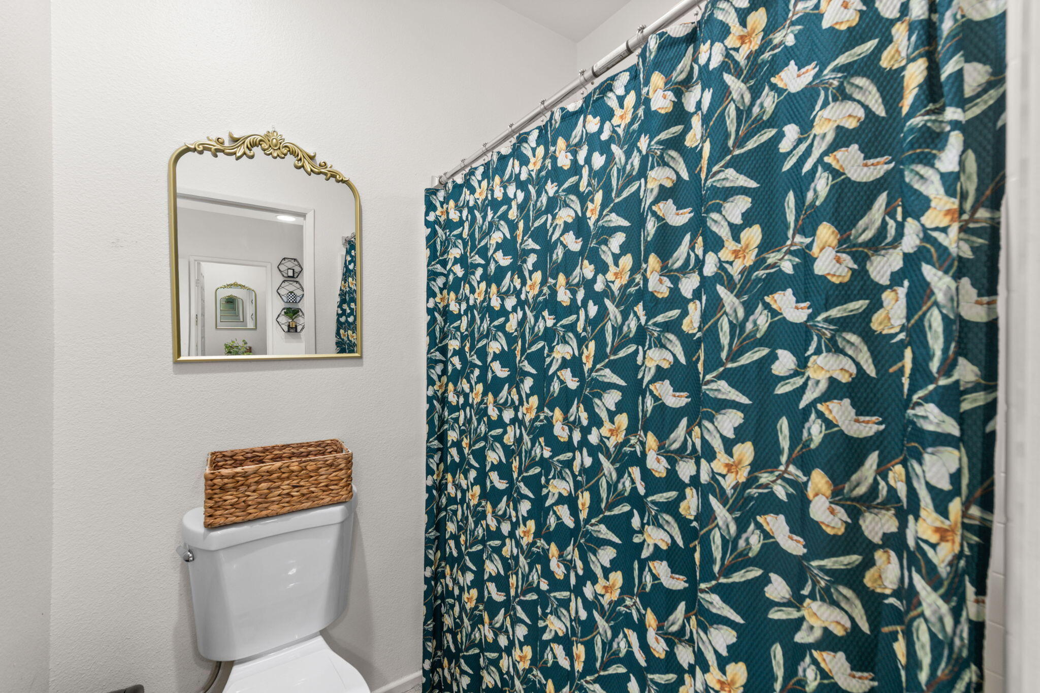 46450 Calle Raphael Indio, CA 92201 - Photo 24 of 29 a bathroom with a toilet and a shower curtain