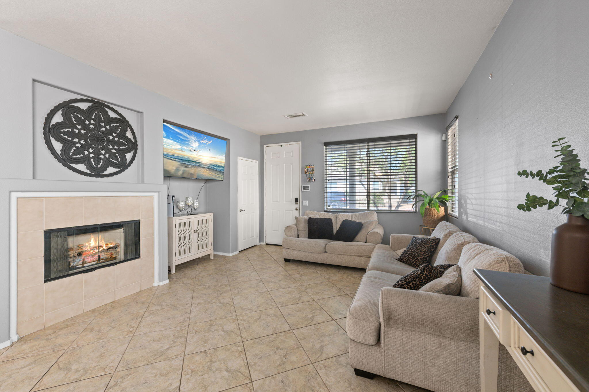 46450 Calle Raphael Indio, CA 92201 - Photo 5 of 29 a living room with furniture and a fireplace