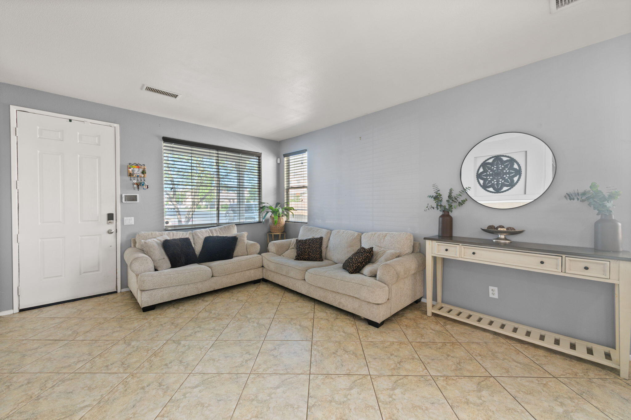 46450 Calle Raphael Indio, CA 92201 - Photo 7 of 29 a living room with furniture and a window