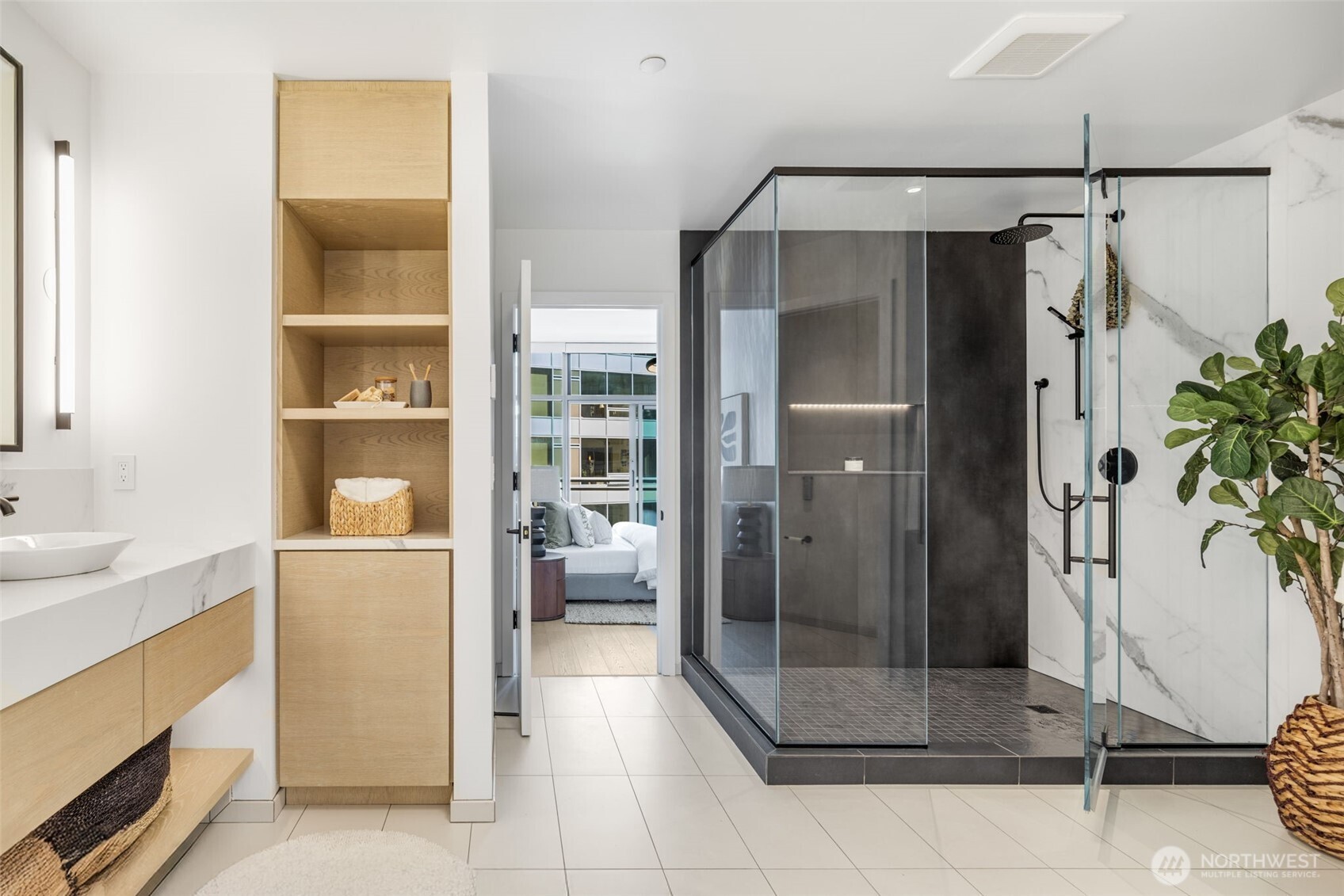 2033 2nd Avenue, Unit 1111 Seattle, WA 98121 - Photo 18 of 40 a bathroom with a shower and a sink