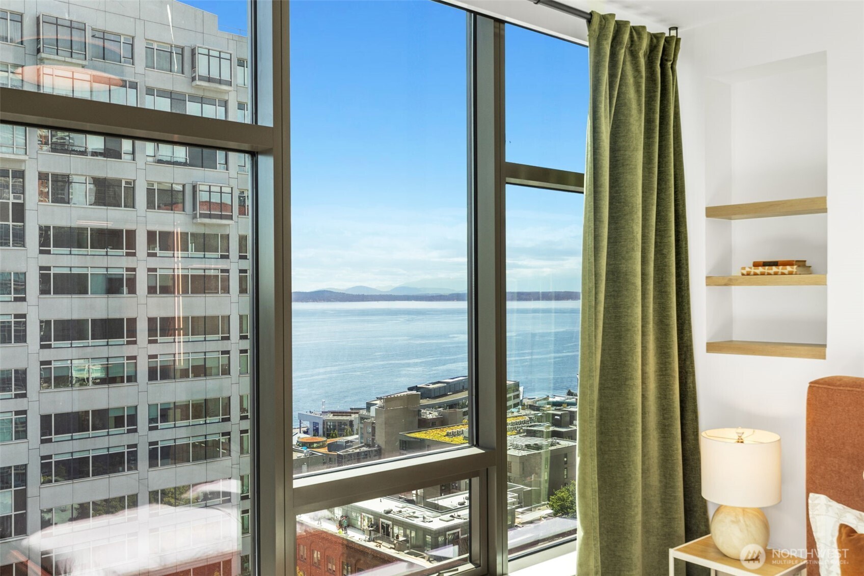 2033 2nd Avenue, Unit 1111 Seattle, WA 98121 - Photo 22 of 40 a view of a glass door with a glass door