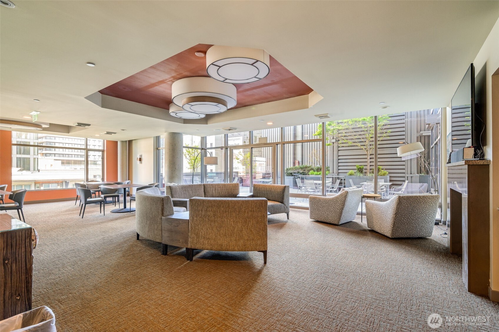 2033 2nd Avenue, Unit 1111 Seattle, WA 98121 - Photo 34 of 40 a living room with furniture and a large window