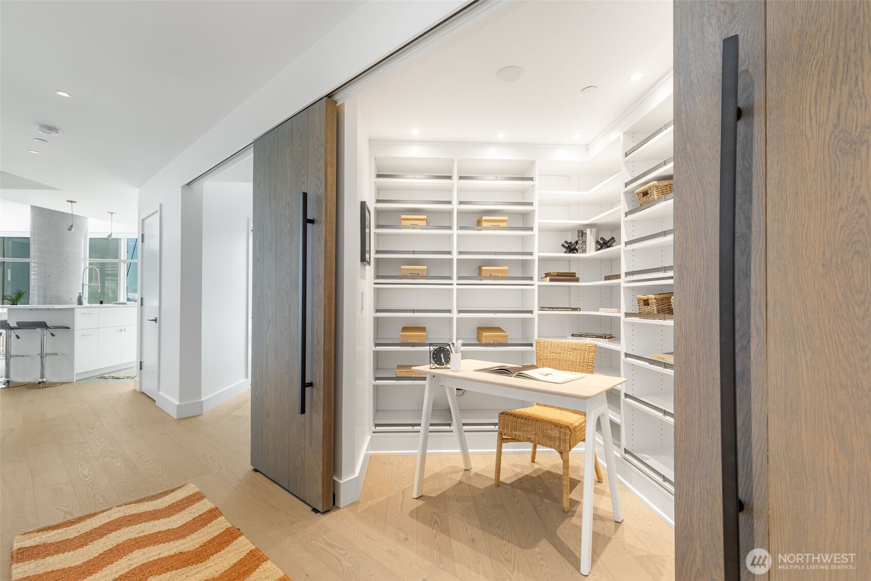2033 2nd Avenue, Unit 1111 Seattle, WA 98121 - Photo 5 of 40 a view of walk in closet with empty racks