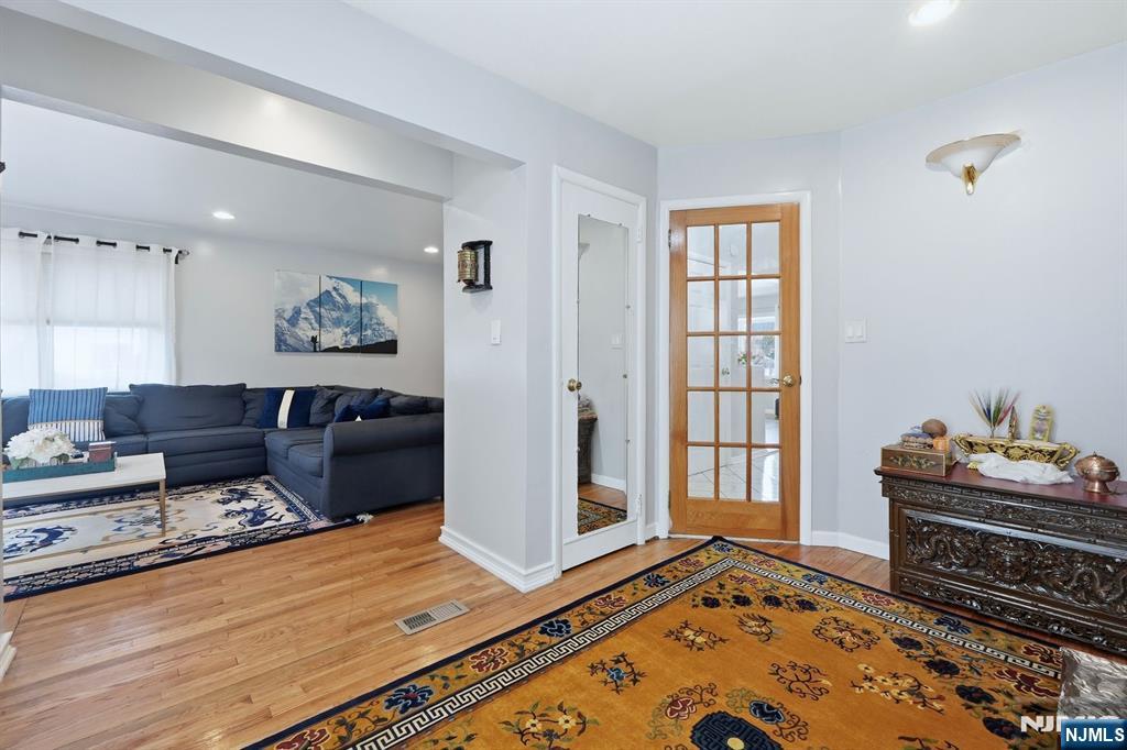39 Voorhees Street Teaneck, NJ 07666 - Photo 16 of 47 a bedroom with furniture and window