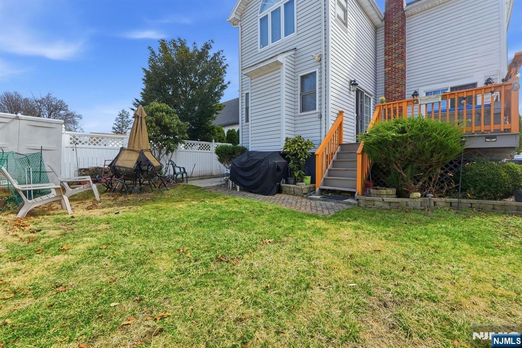 39 Voorhees Street Teaneck, NJ 07666 - Photo 4 of 47 a view of a house with backyard and sitting area