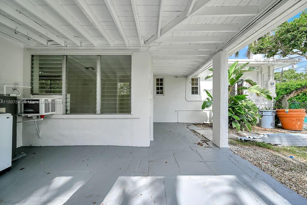 5960 Southwest 47th Street, Unit 1 Miami, FL 33155 - Photo 18 of 39 a view of house with outdoor space