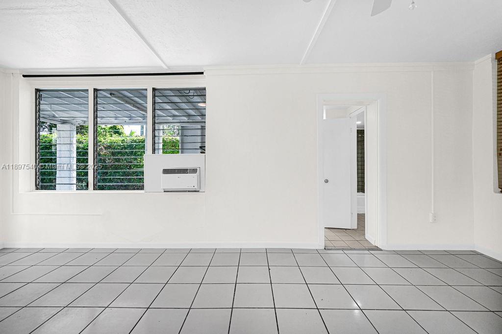 5960 Southwest 47th Street, Unit 1 Miami, FL 33155 - Photo 24 of 39 a view of an empty room