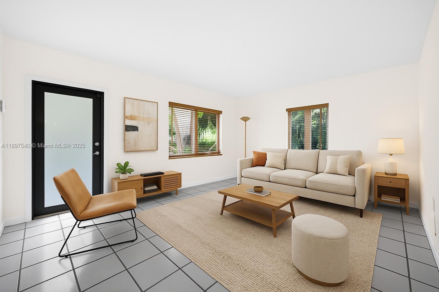 5960 Southwest 47th Street, Unit 1 Miami, FL 33155 - Photo 3 of 39 a living room with furniture and a window