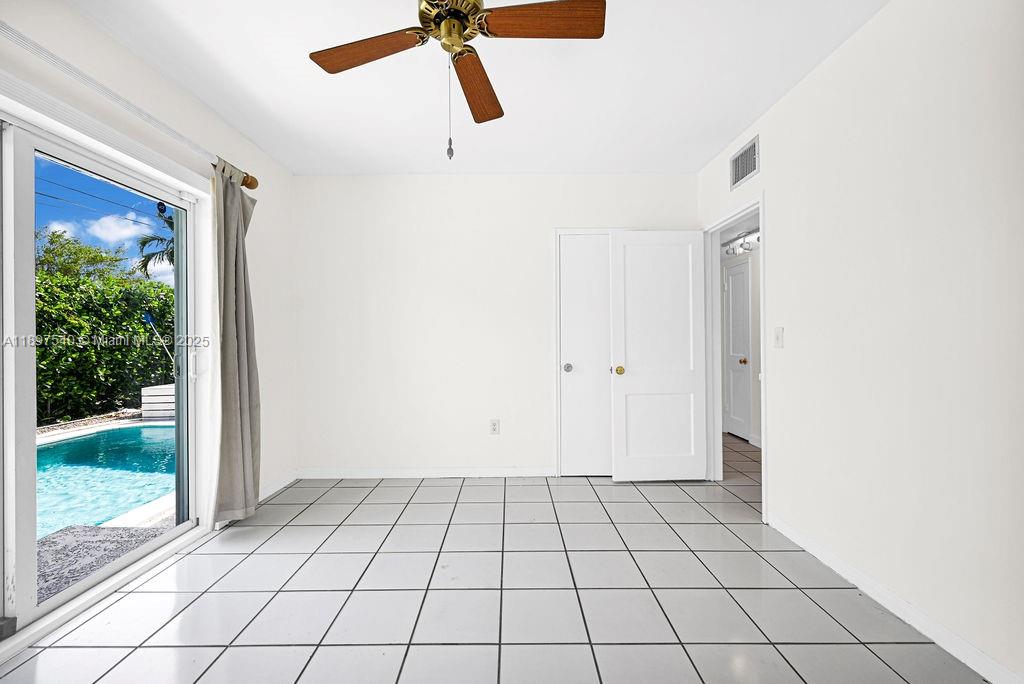 5960 Southwest 47th Street, Unit 1 Miami, FL 33155 - Photo 9 of 39 a view of an empty room