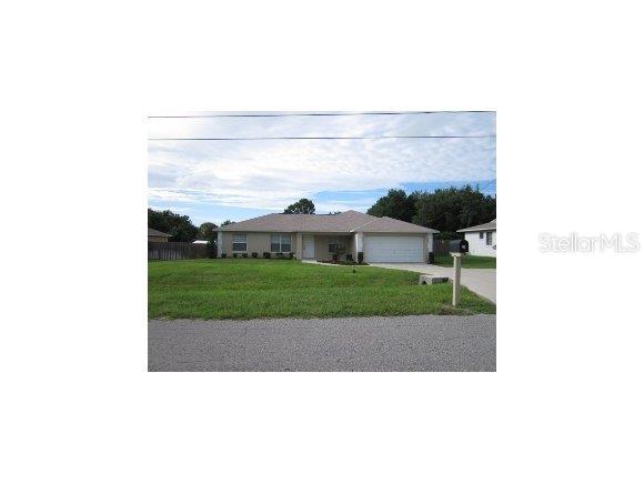 37 Teak Road Ocala, FL 34472 - Photo 1 of 1 a picture of a person on a street