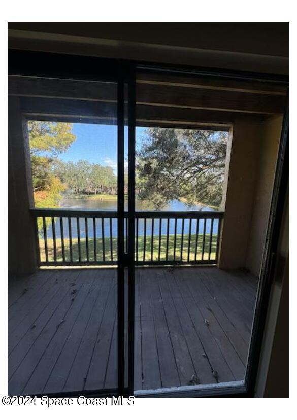 7667 North Wickham Road, Unit 710 Melbourne, FL 32940 - Photo 15 of 23 a view of wooden floor and a window